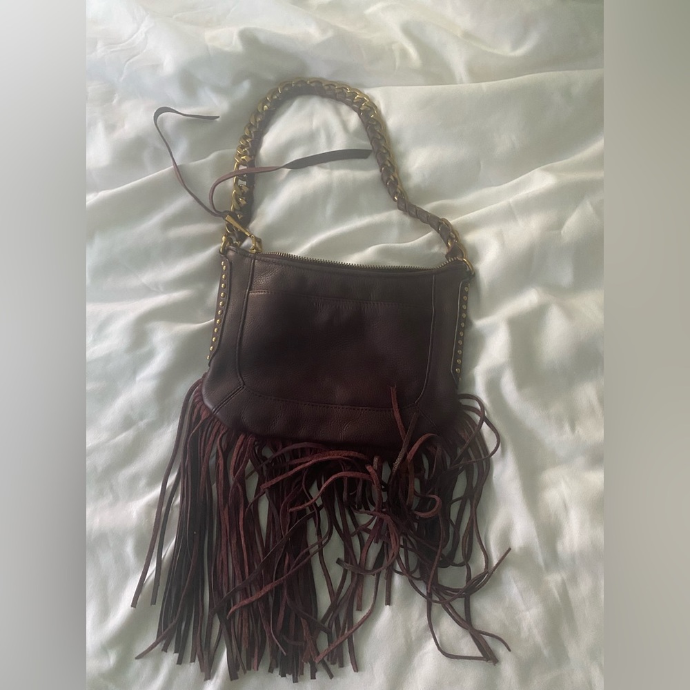 Fringe leather bag with gold hardware
